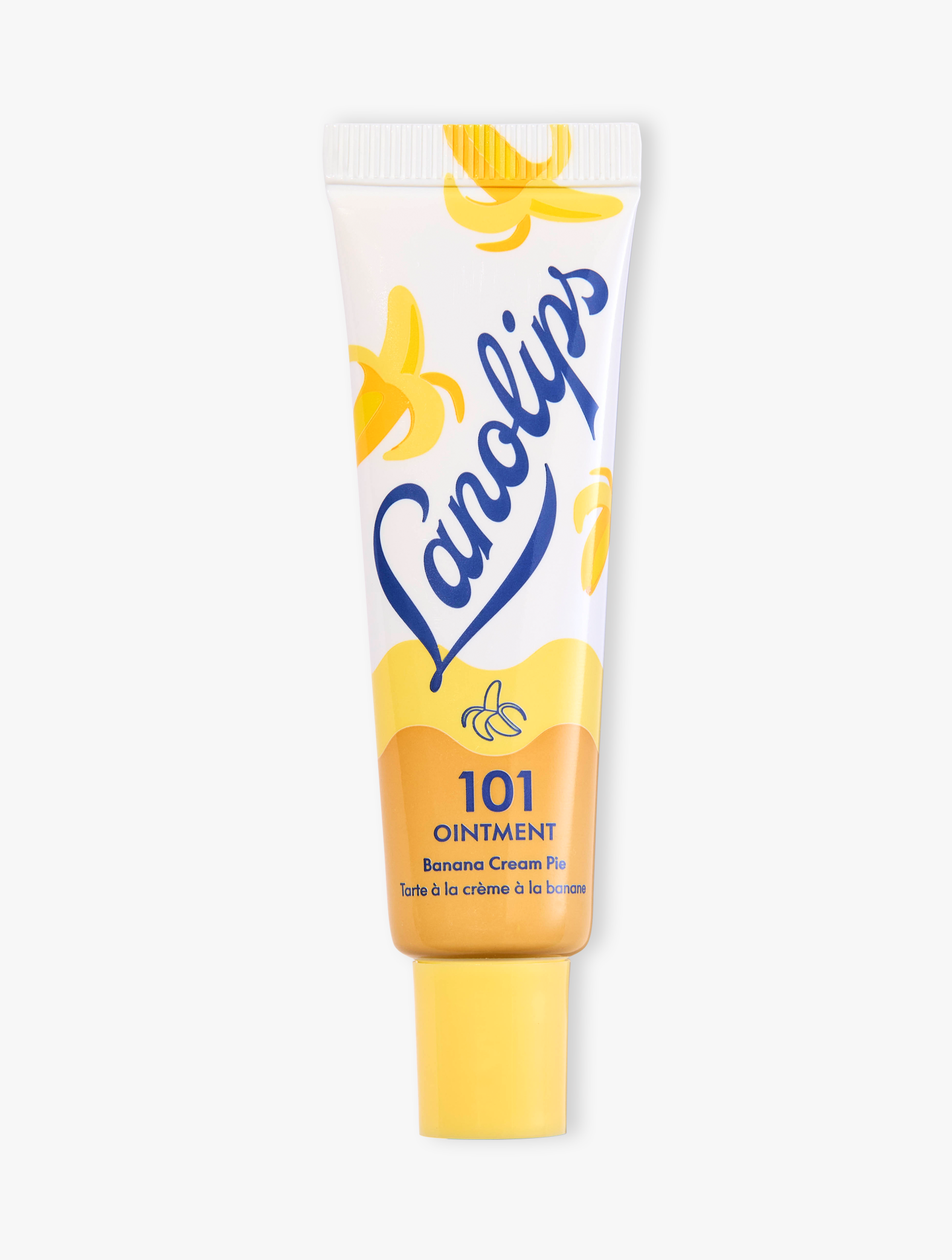 Product shot of the Lanolips 101 Ointment Multi-Balm Banana Cream Pie, featuring the closed tube. 101 Ointment Multi-Balm Banana Cream Pie is part of our 101 Delicious lip balm flavours range. Say NA-NA to dry lips with this all-natural irresistibly creamy banana flavour, infused with a hint of biscuit, caramel & sweet pastry.