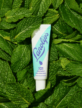 Load image into Gallery viewer, Lanolips 101 Ointment Multi-Balm in Minty. We have taken our iconic Original 101 Ointment and infused it with peppermint + spearmint oils &amp; vitamin E.
