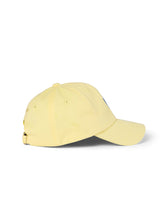 Load image into Gallery viewer, Lanolips Classic Drip Lemon Cap side view.
