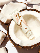 Load image into Gallery viewer, Lanolips Lip Scrub Coconutter is a 100% natural balm based scrub, containing ingredients including our ultra-pure grade lanolin, real finely grated coconut shell pieces and sugar.
