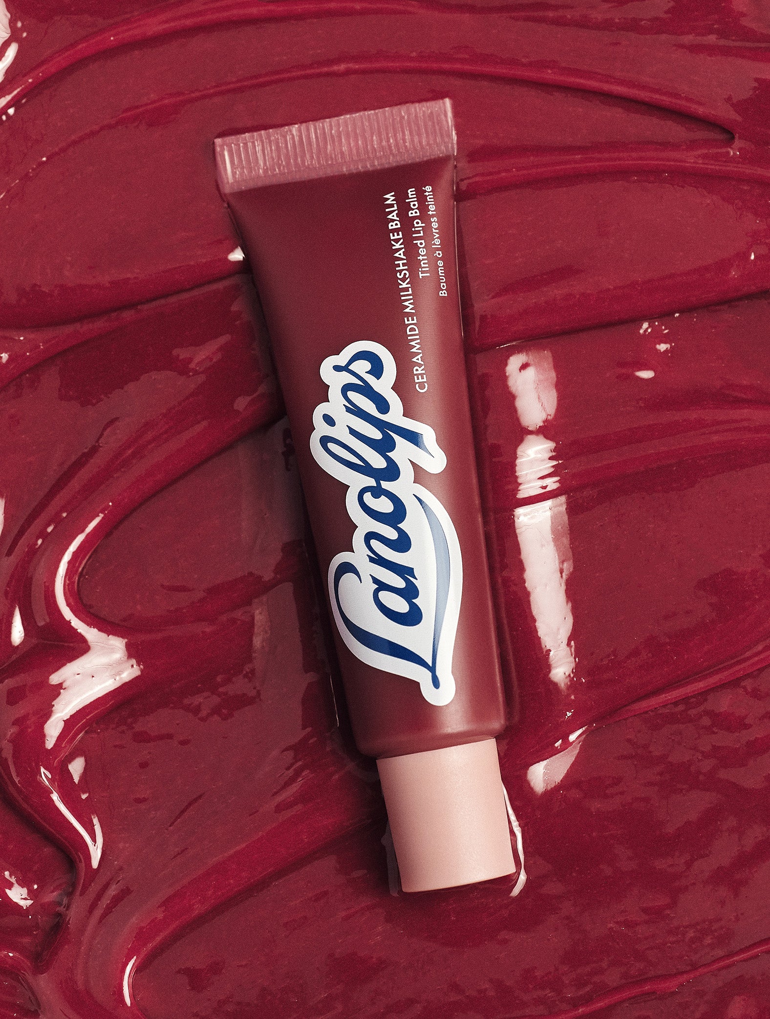 Lanolips Ceramide Milkshake Balm Mocha Choca shade on glossy texture, nourishing tinted lip balm with lanolin ,ceramides and murumuru butter