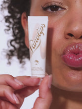 Load and play video in Gallery viewer, Video of Lanolips Lip Scrub. Comes in two delicious flavours: Coconutter and Strawberry.
