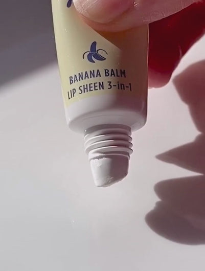 Video of Lanolips Banana Balm Lip Sheen 3-in-1 being squeezed from the tube