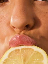 Load image into Gallery viewer, Close up shot of model wearing the Lemonaid Lip Treatment
