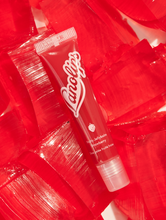 Load image into Gallery viewer, Fruity Jellybalm in Strawberry has a light transparent red tint.
